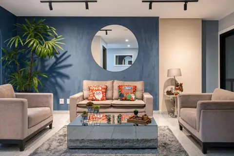 Sala de apartamento de temporada decorada pela RIOS em Cabo Frio