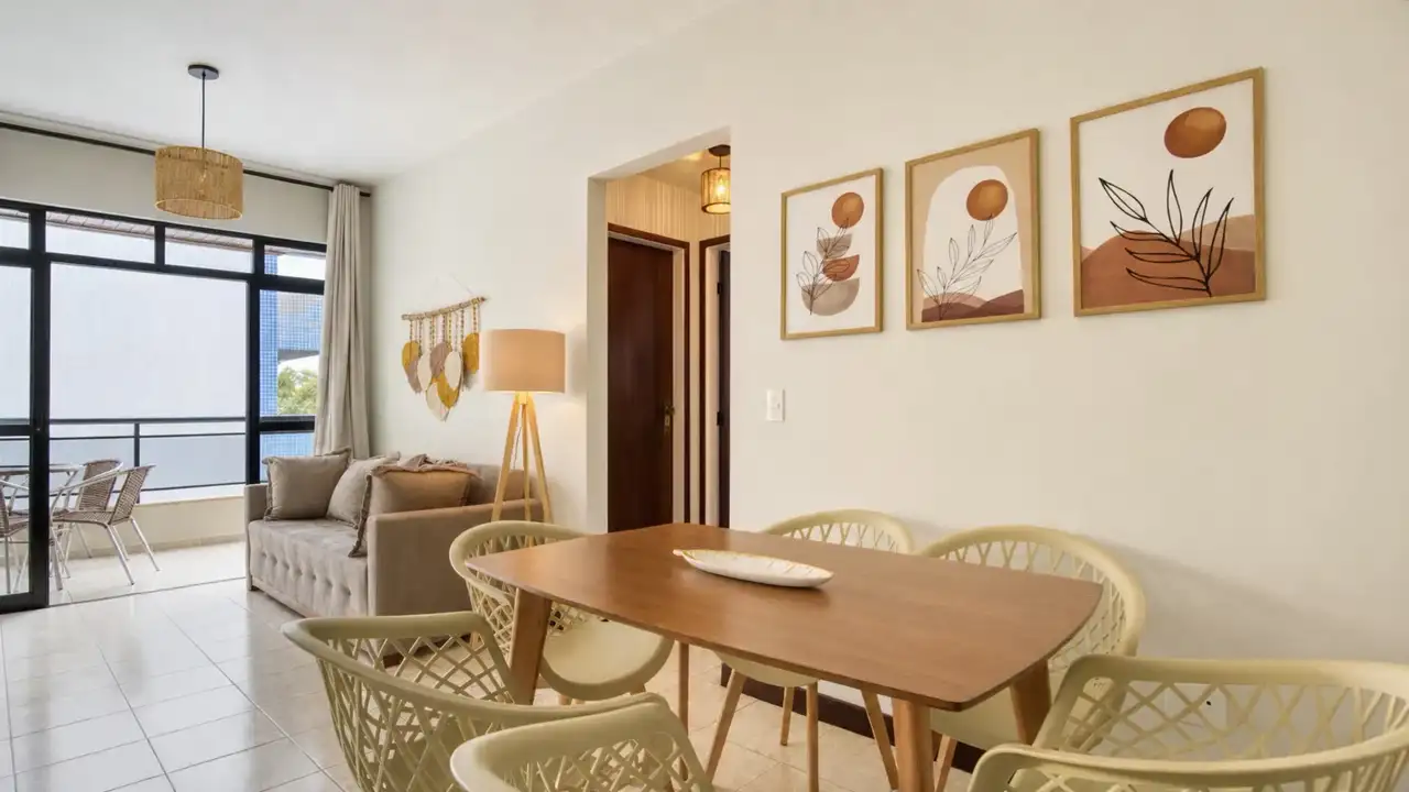 Sala de imóvel de temporada decorada pela RIOS