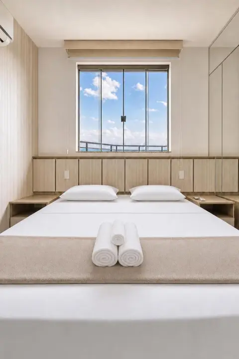 Quarto de apartamento de temporada decorado pela RIOS em Cabo Frio